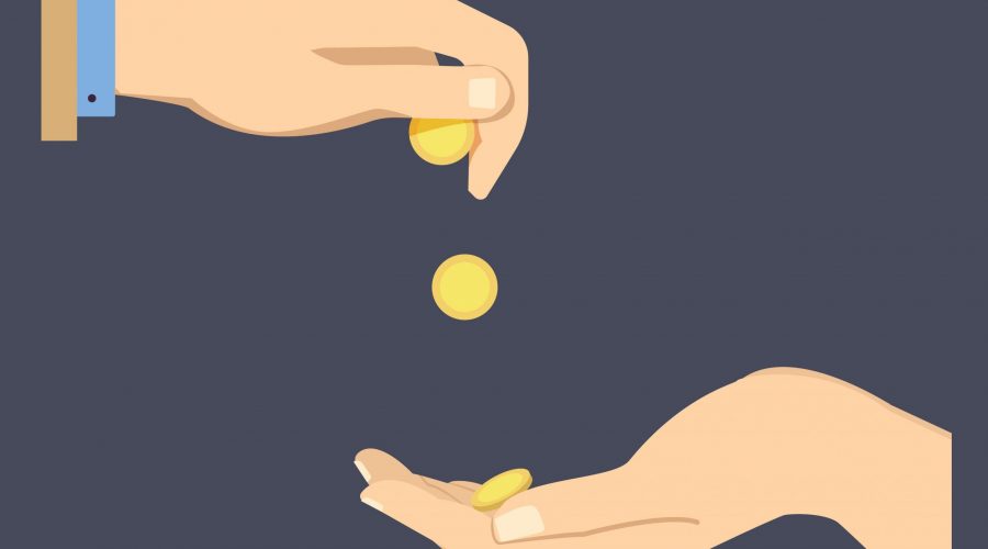 Coins dropping into hand