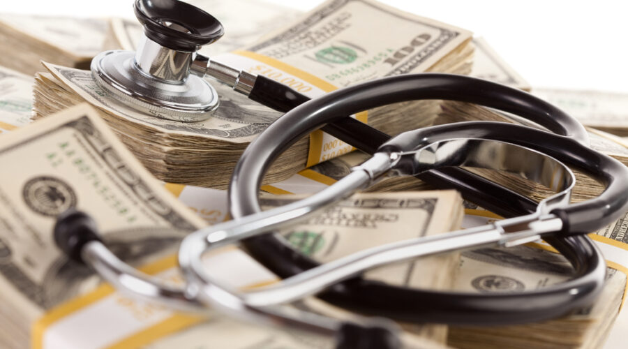 Stethoscope on money