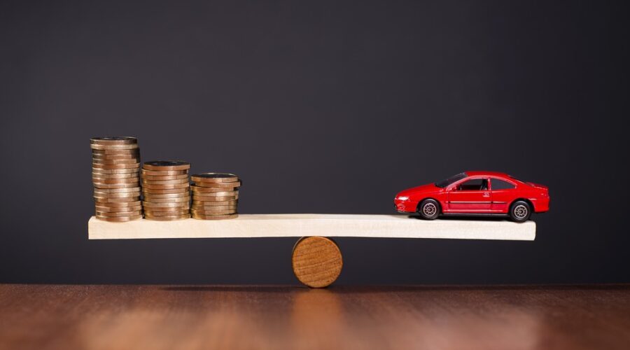 Car and coins balancing