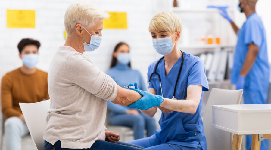 Woman receiving vaccine