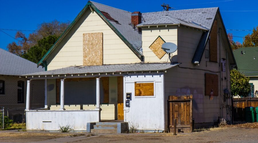 Boarded up house