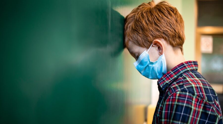 Young student wearing mask