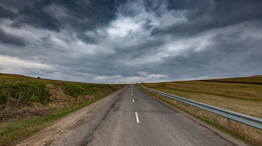 Storm clouds over highway