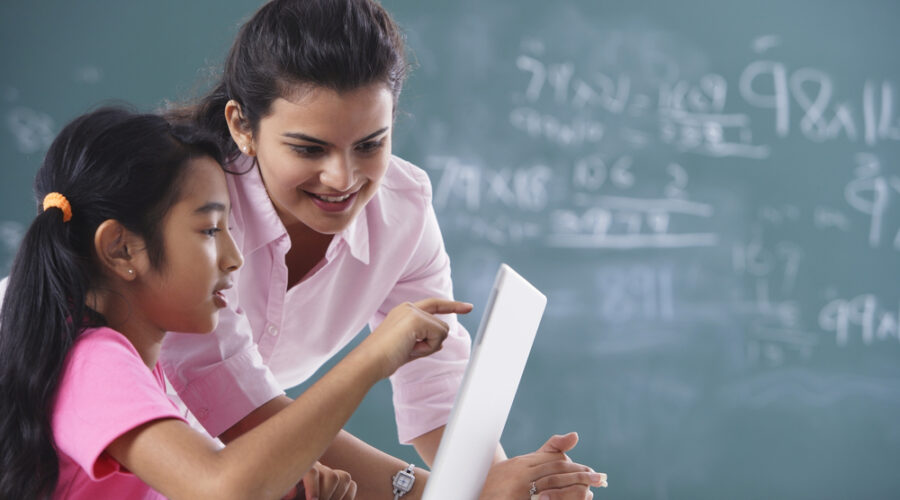 Teacher with student