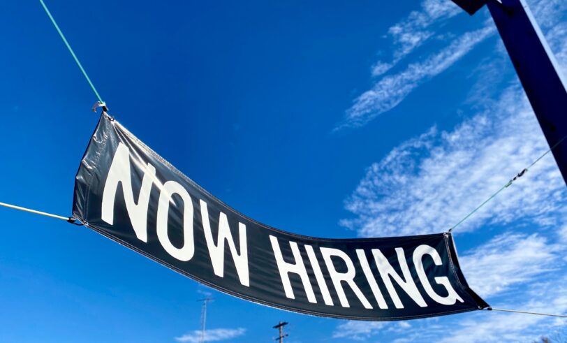 "Now Hiring" banner