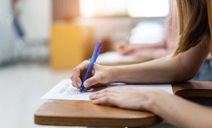 Student taking test, education accountability, open enrollment, education assessments, testing