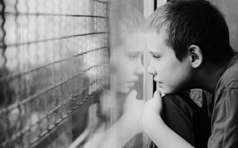 Child looking out window