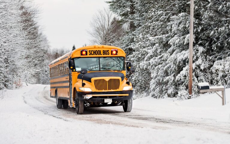 School bus on road in winter