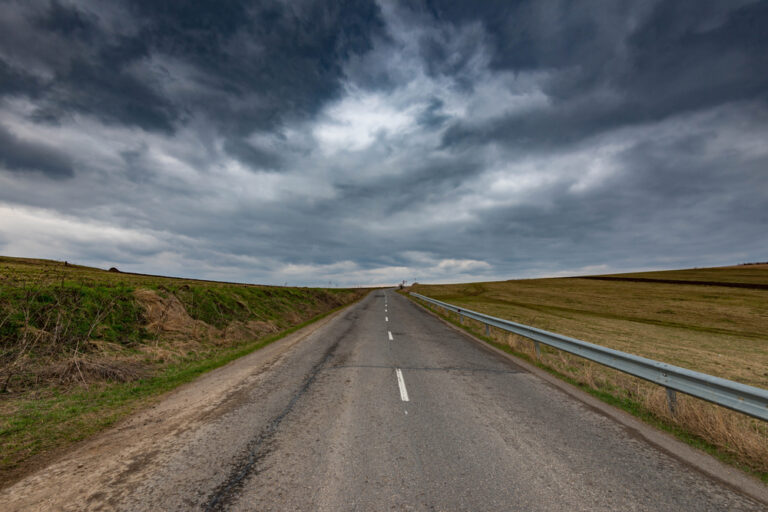 Storm clouds over highway