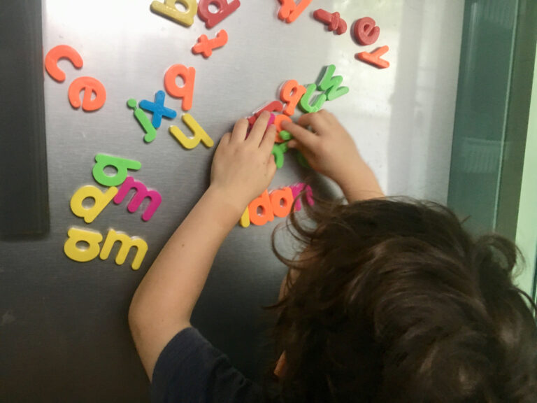 Kid with letters