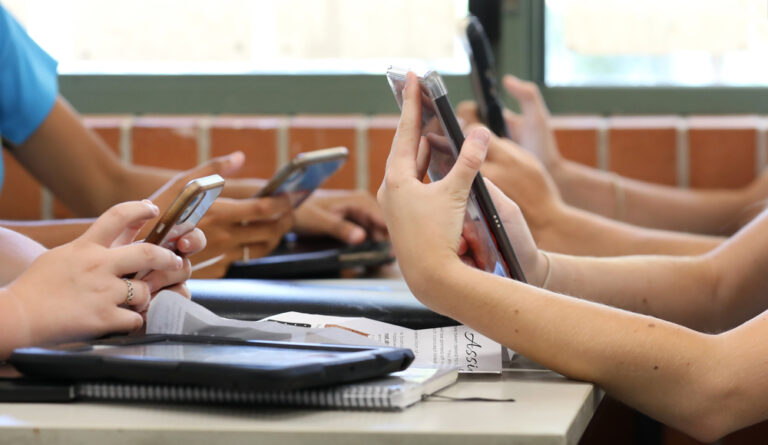 Cell phones in schools, cell phones bans, kids using cell phones, technology in classrooms