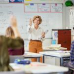 Teacher in classroom, education equity, AP classes